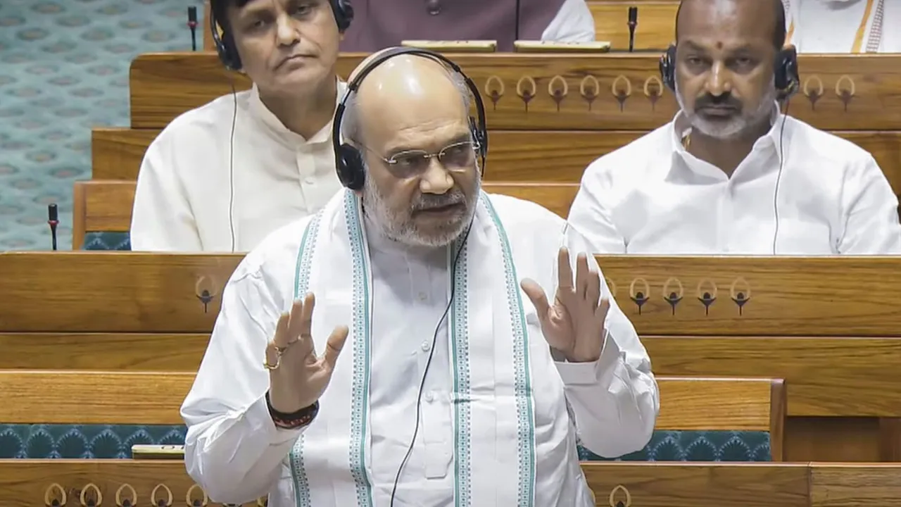 Union Home Minister Amit Shah speaks in the Lok Sabha during the Monsoon session of Parliament, in New Delhi, Tuesday, Aug. 6, 2024.