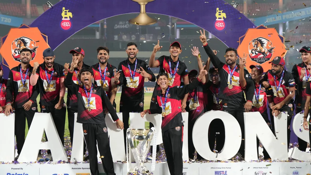 East Delhi Riders players celebrate with the trophy after winning the Delhi Premier League, at Arun Jaitley Stadium, in New Delhi, Sunday night, Sept. 8, 2024.