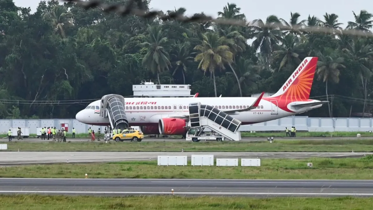 Security personnel conduct inspection of an Air India aircraft after it received a bomb threat, in Thiruvananthapuram, Thursday, Aug. 22, 2024.