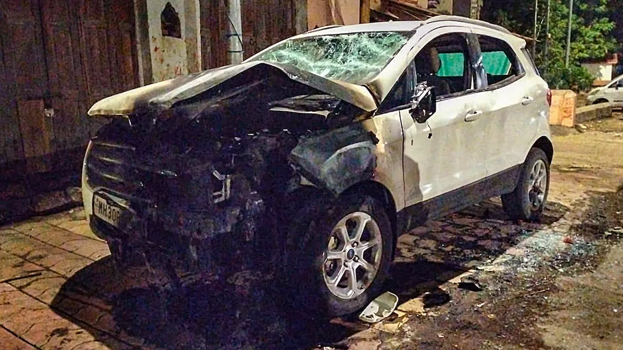 A vehicle damaged during a clash that broke out between members of two communities over a social media post in Akola