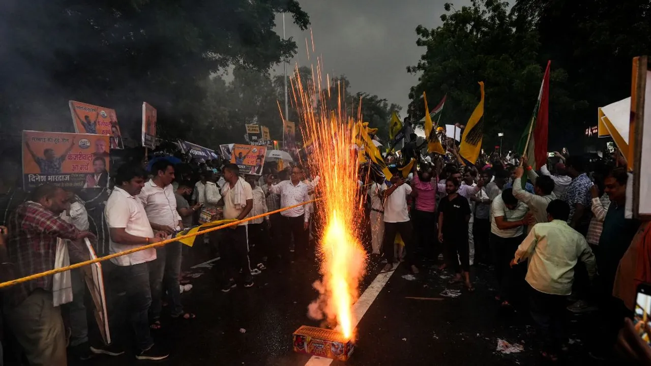 Supporters celebrate Delhi Chief Minister Arvind Kejriwal's release from the Tihar Jail on bail granted by the Supreme Court in a case registered by the CBI in the excise policy case, in New Delhi, Friday, Sept. 13, 2024