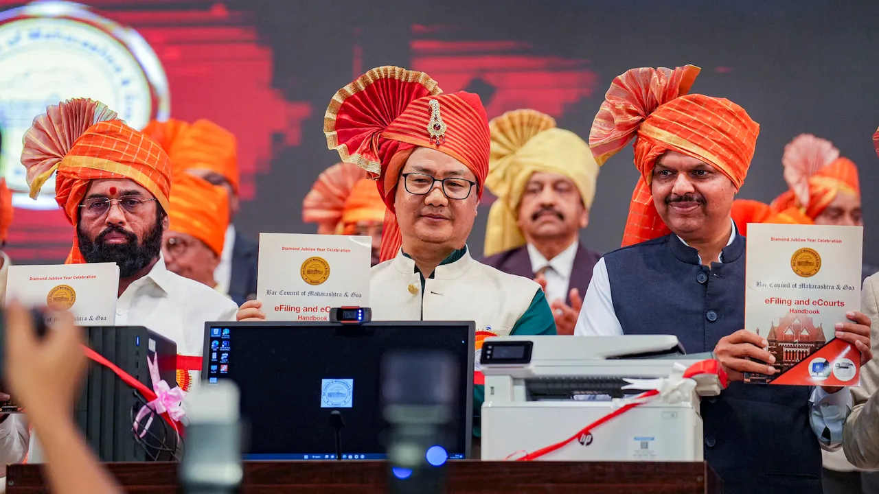 Kiren Rijiju with Eknath Shinde and Devendra Fadnavis during inaugural function of "e-Filing' and and e-Court by The Bar Council of Maharashtra and Goa in Mumbai on May 2
