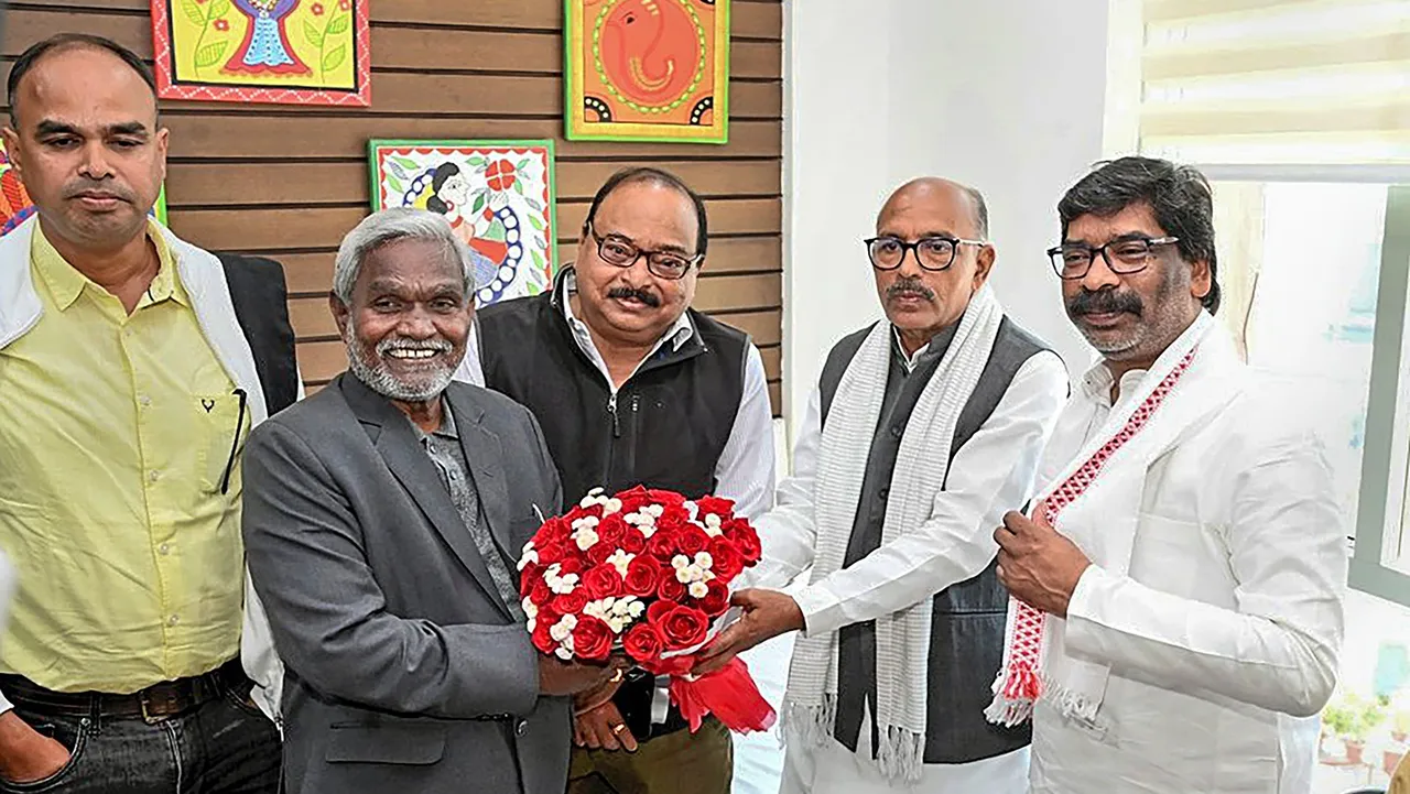 Jharkhand Chief Minister Champai Soren being greeted by former chief minister Hemant Soren after he won the floor test in the state Assembly, in Ranchi