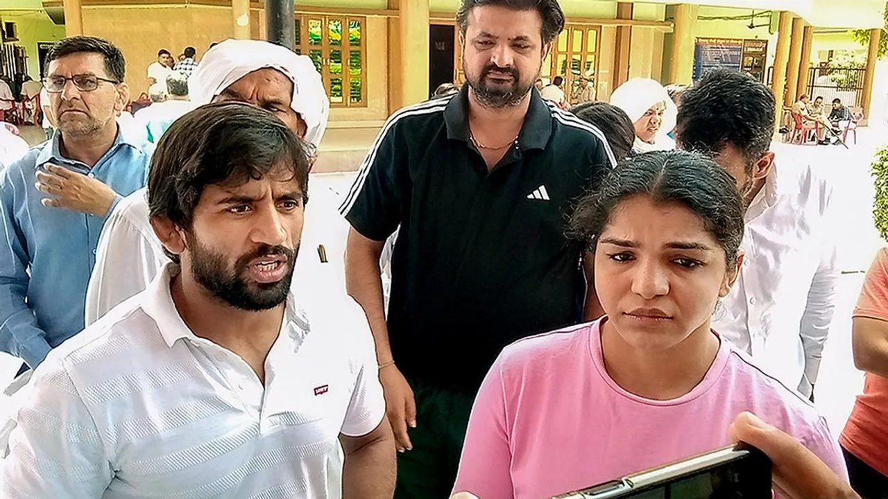 Wrestlers Bajrang Punia and Sakshi Malik. 