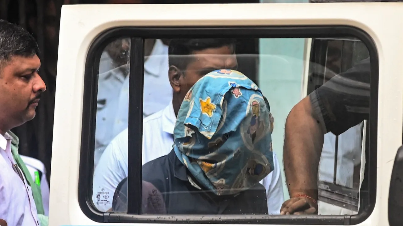 Police personnel produce the accused arrested in connection with the alleged rape and murder of a woman trainee doctor at RG Kar Medical College and Hospital, at a City Court in Kolkata, Saturday, Aug 10, 2024. The court has sent the accused to 14-day police custody.