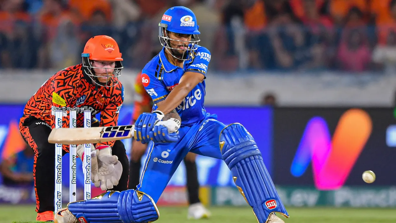 Mumbai Indians batter Tilak Varma plays a shot during the Indian Premier League (IPL) 2024 T20 cricket match between Sunrisers Hyderabad and Mumbai Indians, at Rajiv Gandhi International Cricket Stadium, Uppal, in Hyderabad, Wednesday, March 27, 2024. 