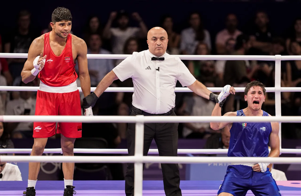 India's Nishant Dev (in red) looks on after lost against Alvarez Marco Verde of Mexico during their men's 71kg quarterfinal boxing match at the 2024 Summer Olympics, Paris, France, Saturday, Aug. 3, 2024