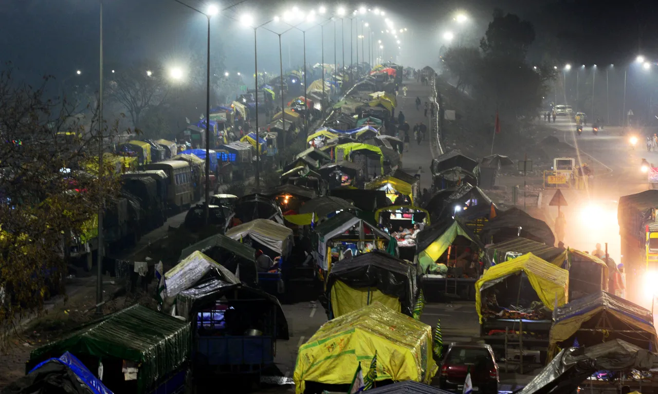 Tractors and trolleys are parked on a highway during the ongoing farmers’ protest at the Punjab-Haryana Shambhu Border, in Patiala district