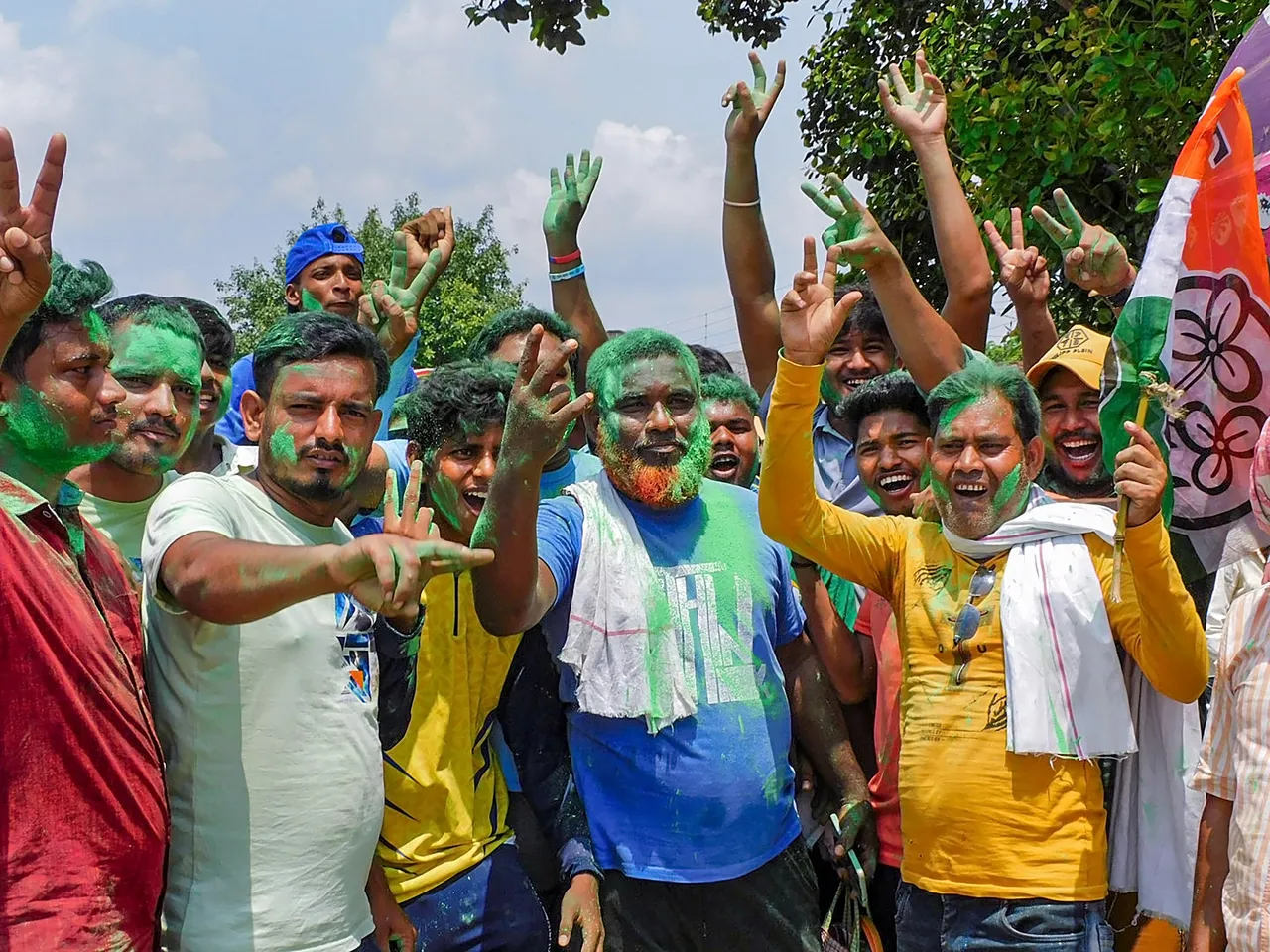 TMC workers and supporters celebrate the party's lead during the counting of votes of the West Bengal panchayat polls, in Bankura district