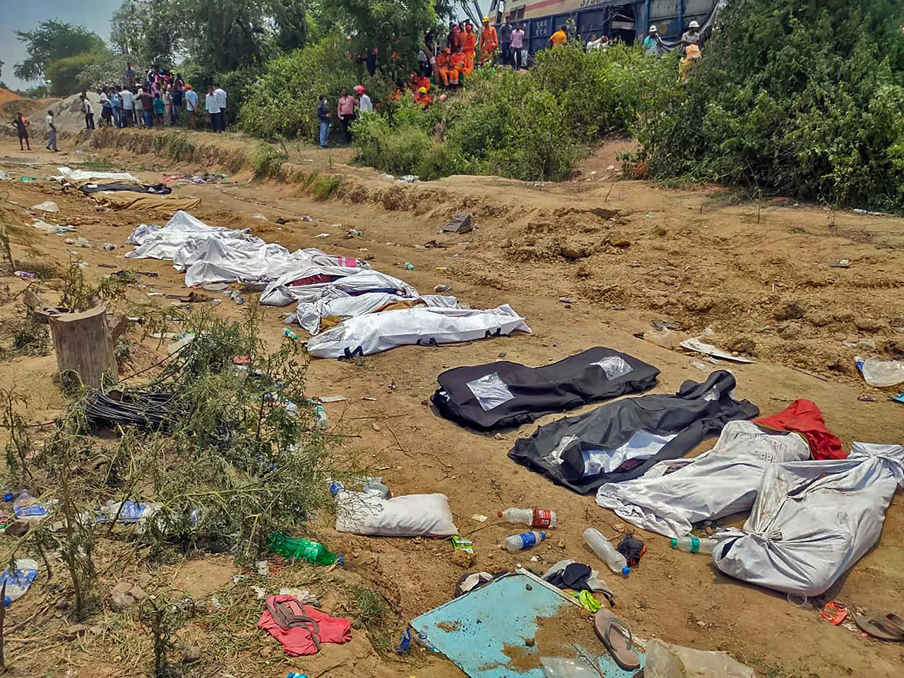 The bodies of victims at the accident site after the triple train accident, in Balasore district