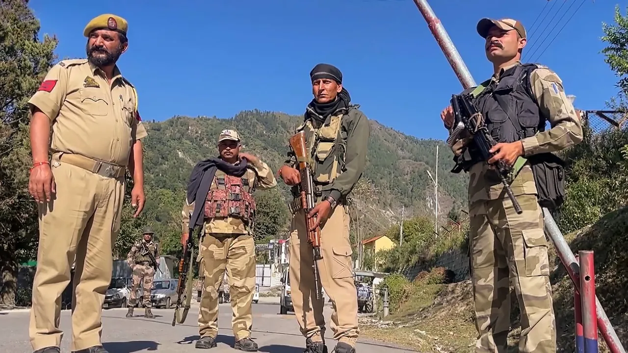 Security personnel stand guard along the Bani-Billawar road days after the Billawar terror attack, in Kathua, Monday, Sept. 30, 2024.