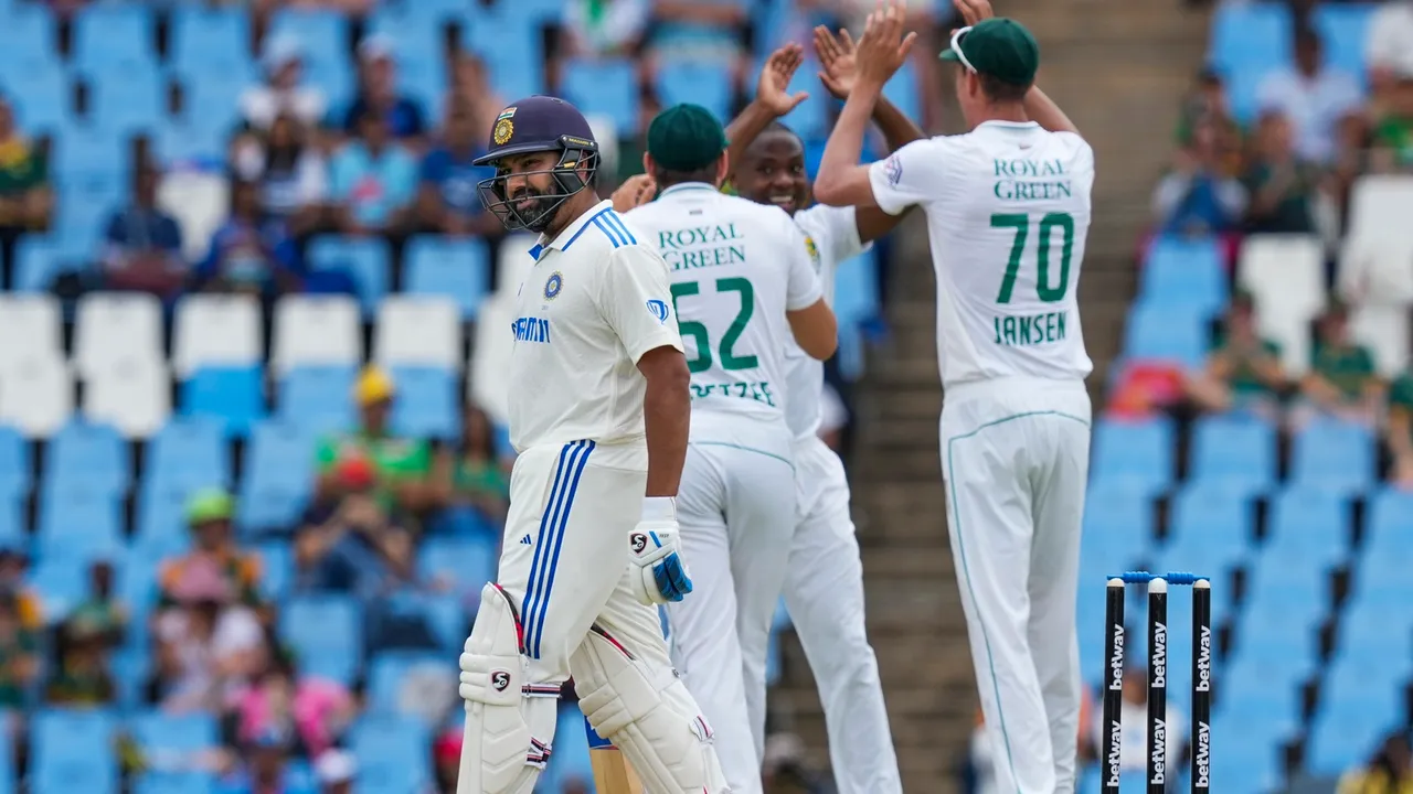 South Africa's Kagiso Rabada celebrates the wicket of India s captain Rohit Sharma