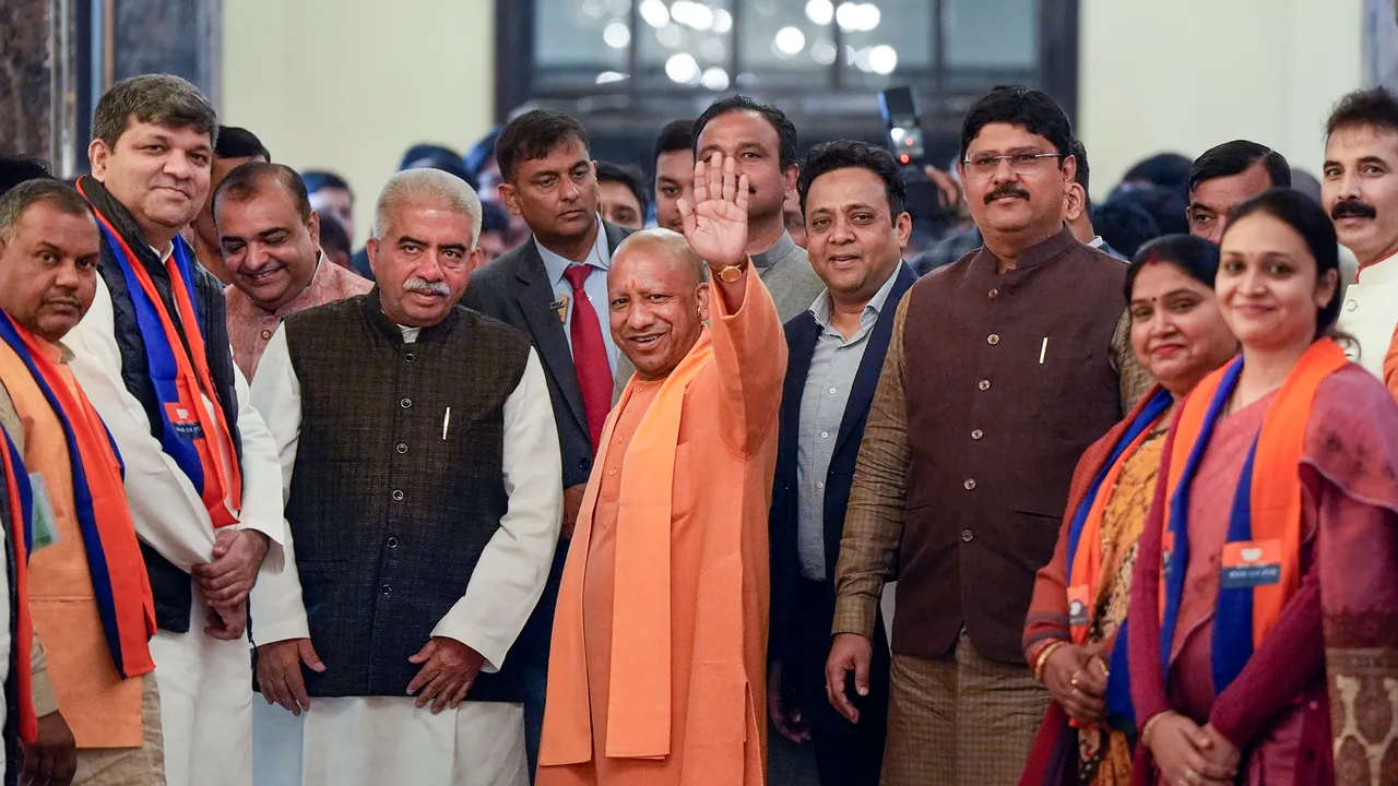 Uttar Pradesh Chief Minister Yogi Adityanath arrives to attend the winter session of the Uttar Pradesh Assembly session, in Lucknow