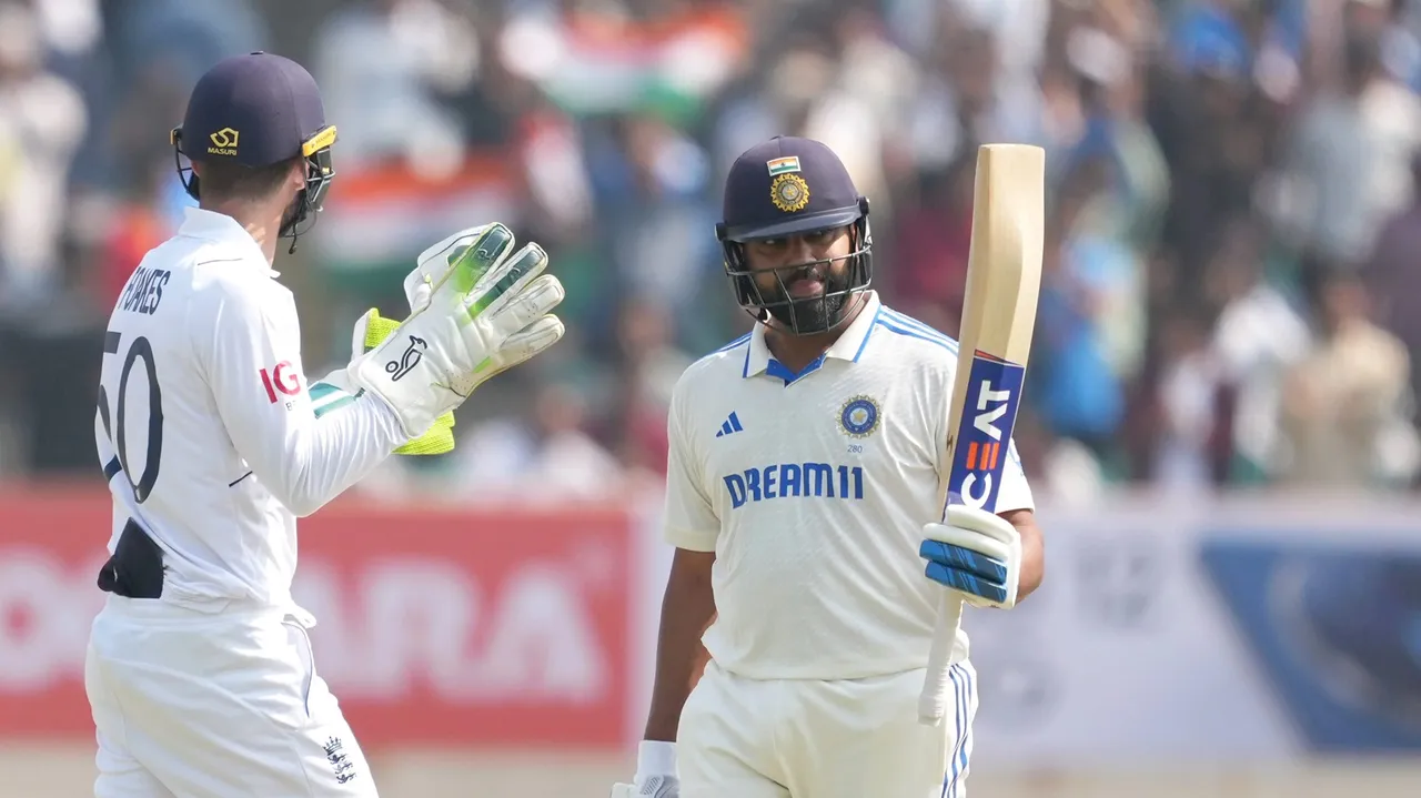 India's captain Rohit Sharma celebrates his fifty on the first day of the third cricket test match between India and England