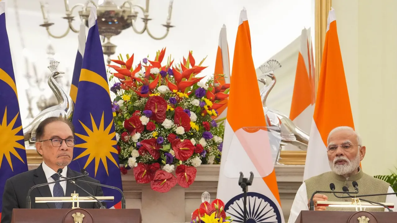 Prime Minister Narendra Modi and his Malaysian counterpart Anwar Ibrahim during the joint press statement after their meeting, at Hyderabad House, in New Delhi, Tuesday, Aug. 20, 2024.