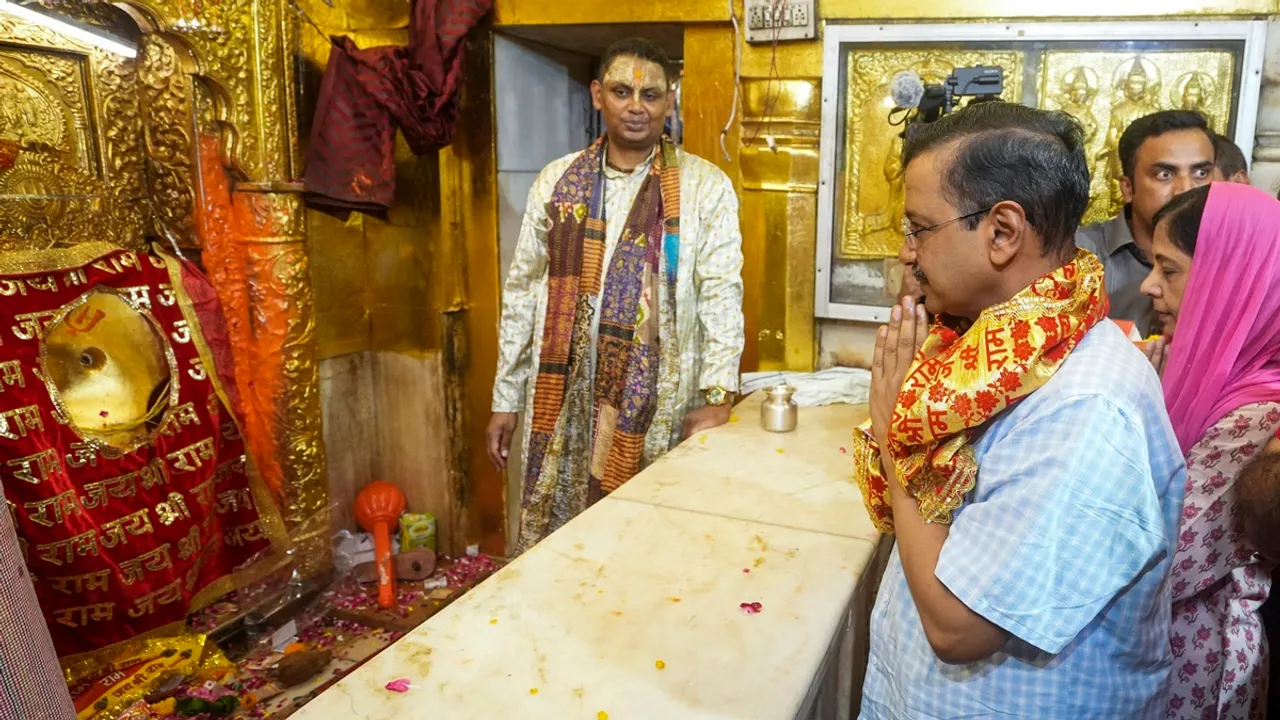 Delhi Chief Minister Arvind Kejriwal with wife Sunita Kejriwal offers prayers at the Hanuman Temple at Connaught Place, in New Delhi, Saturday, Sept. 14, 2024