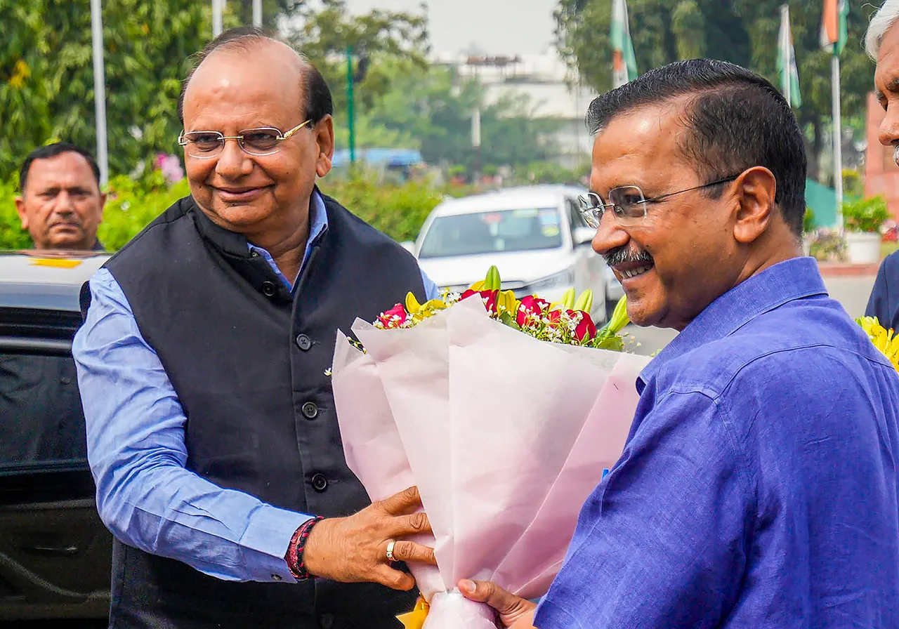 Delhi LG VK Saxena being welcomed by Chief Minister Arvind Kejriwal for the Budget Session in New Delhi