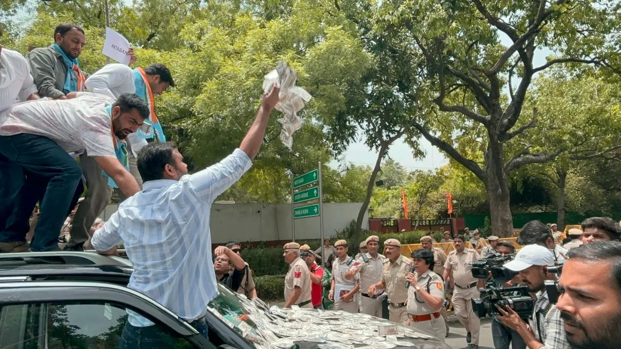 Members of National Students' Union of India (NSUI) stage a protest outside the residence of Union Education Minister Dharmendra Pradhan over the NEET-UG and UGC-NET examinations issue, in New Delhi, Thursday, June 20, 2024.
