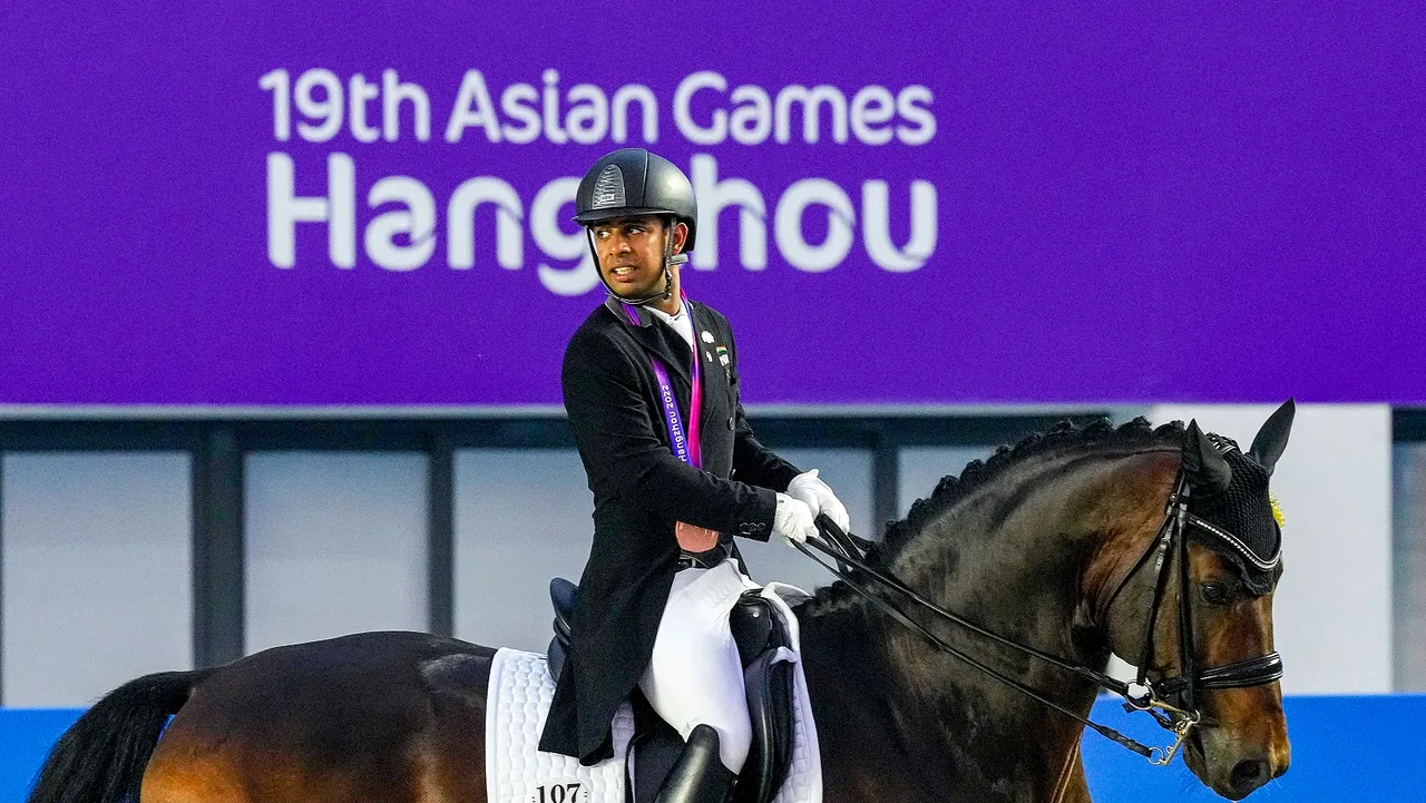 India’s Anush Agarwalla rides his horse Etro as he competes in the Equestrian Dressage Individual Final event at the 19th Asian Games, in Hangzhou, China