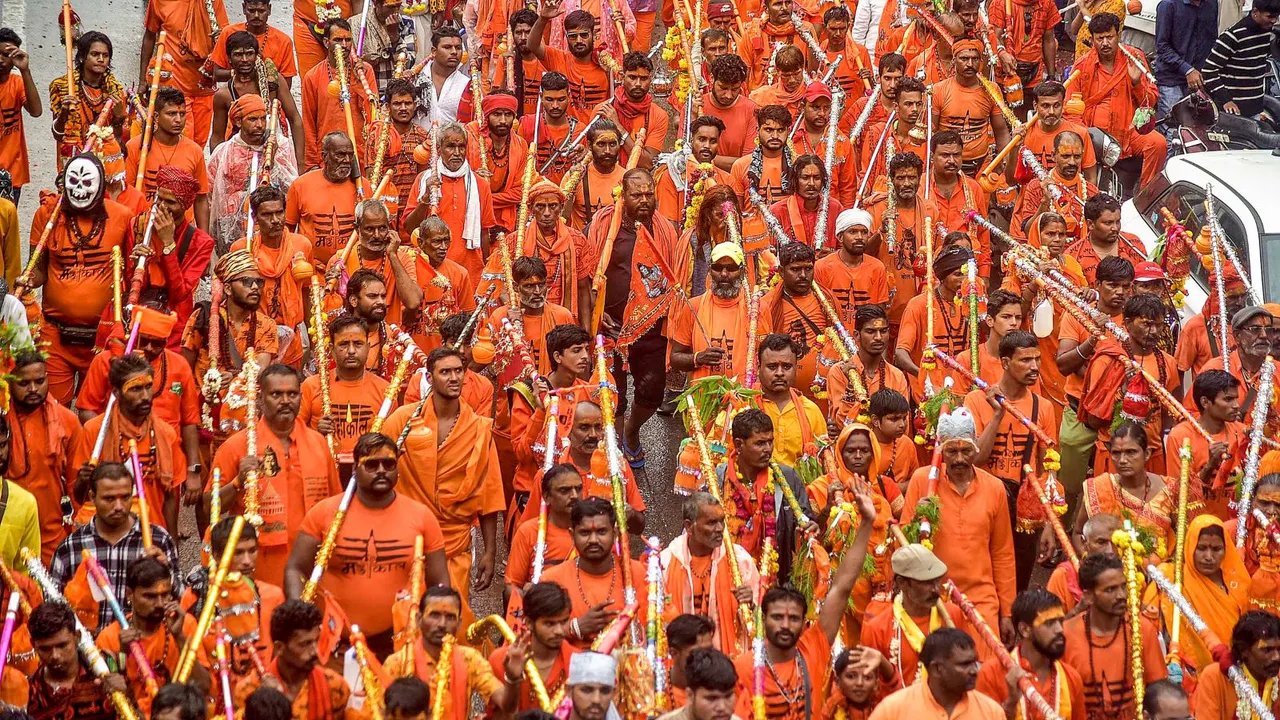 Shiva devotees during their Kanwad Yatra in the month of Shravan, in Indore, Friday, July 26, 2024.