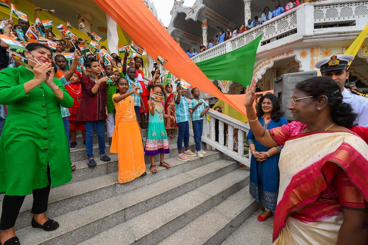 President Droupadi Murmu being greeted by Indian community people during a visit to Arya Diwaker Mandir and Shri Vishnu Mandir, in Paramaribo