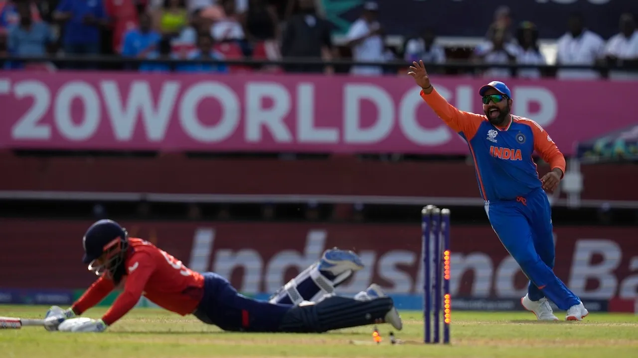 Rohit Sharma celebrates run out of Adil Rashid