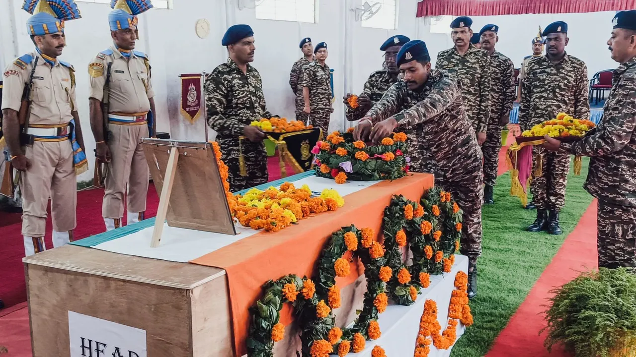CRPF personnel lay wreath at the mortal remains of CRPF Inspector Kuldeep Singh, who was killed in a recent terrorist terrorist attack, at CRPF headquarters in Udhampur, Tuesday, Aug. 20, 2024.