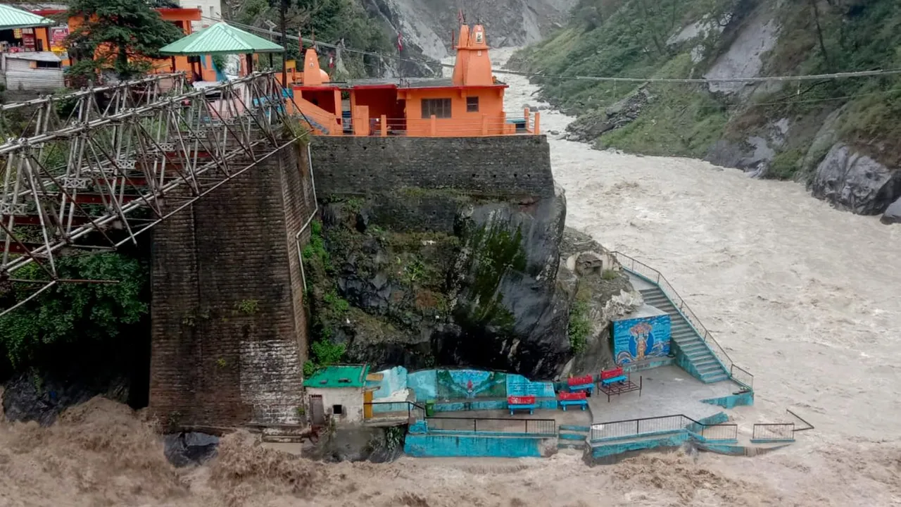 Alaknanda river after its water level rose following heavy rainfall in upper reaches, near Badrinath Temple, in Chamoli district
