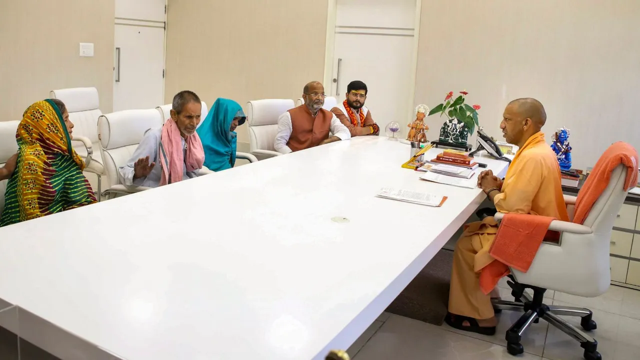 UP Chief Minister Yogi Adityanath meets family members of the victim of Bahraich violence, in Lucknow, Tuesday, Oct. 15, 2024.