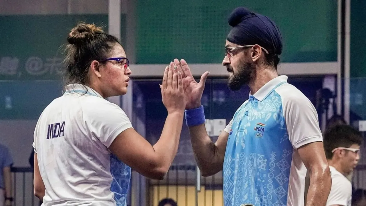 Dipika Pallikal and Harinder Pal Singh Sandhu Squash.jpg