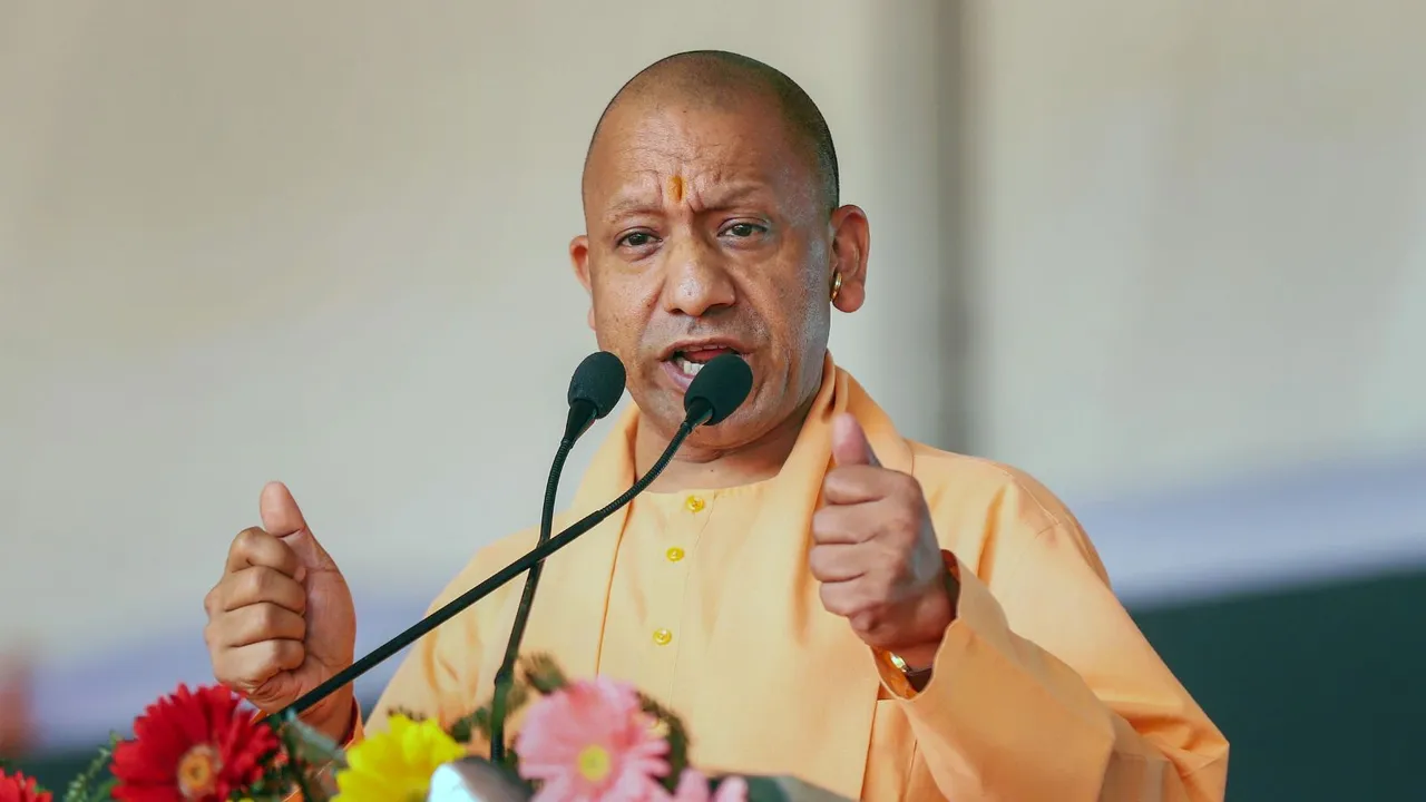 Uttar Pradesh Chief Minister Yogi Adityanath addresses during a 'Prabuddha Varg Sammelan' ahead of upcoming Lok Sabha elections, in Pilibhit, Tuesday, April 2, 2024