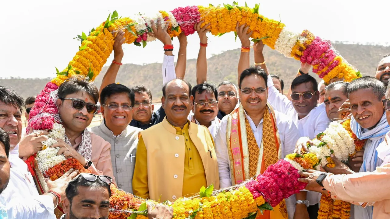 Lok Sabha Speaker Om Birla and Rajasthan Chief Minister Bhajanlal Sharma being welcomed by BJP workers upon their arrival in Mehandipur, in Dausa district, Friday, May 31, 2024