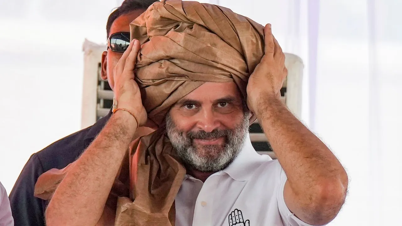 Leader of Opposition in Lok Sabha Rahul Gandhi greets supporters during a public meeting Vijay Sankalp Jansabha ahead of the Haryana Assembly elections, in Nuh district, Thursday, Oct. 3, 2024.
