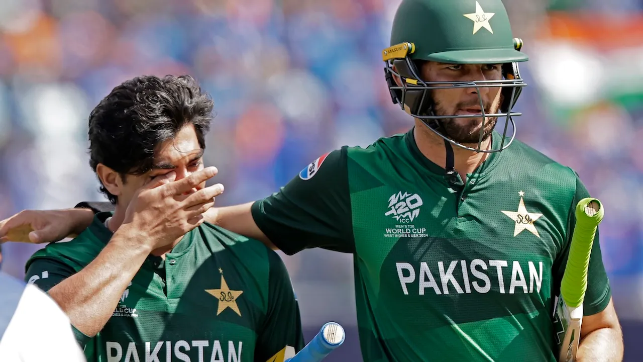 Pakistan's Shaheen Shah Afridi, right, consoles batting partner Naseem Shah as they leave the field after their loss in the ICC Men's T20 World Cup cricket match between India and Pakistan at the Nassau County International Cricket Stadium in Westbury, New York, Sunday, June 9, 2024.