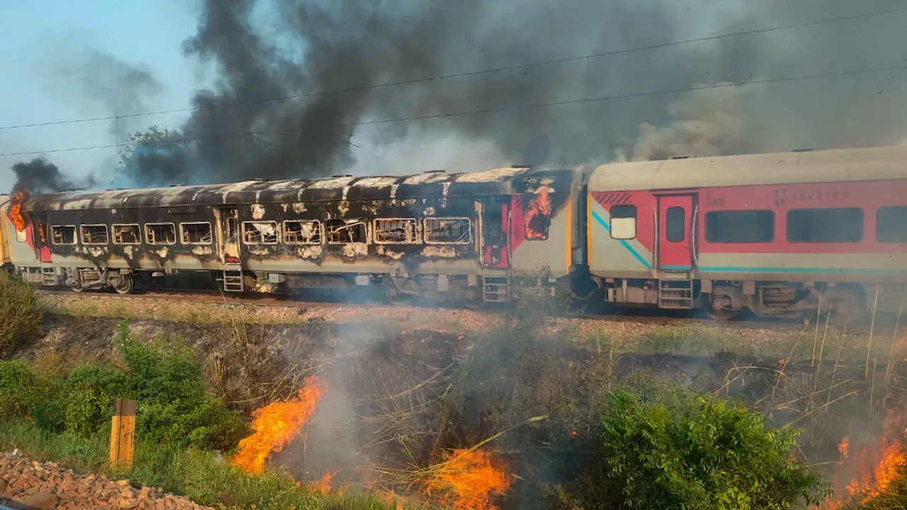 Coaches of the Patalkot Express after a fire broke out, near Bhadai railway station in Agra, Wednesday, Oct. 25, 2023.