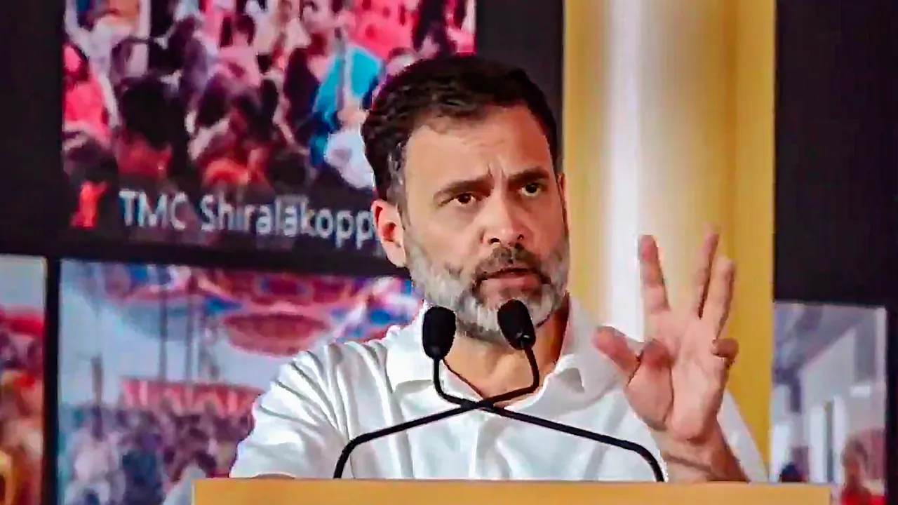 Congress leader Rahul Gandhi addresses a gathering during the inauguration of the state government's Gruha Laxmi scheme, in Mysuru
