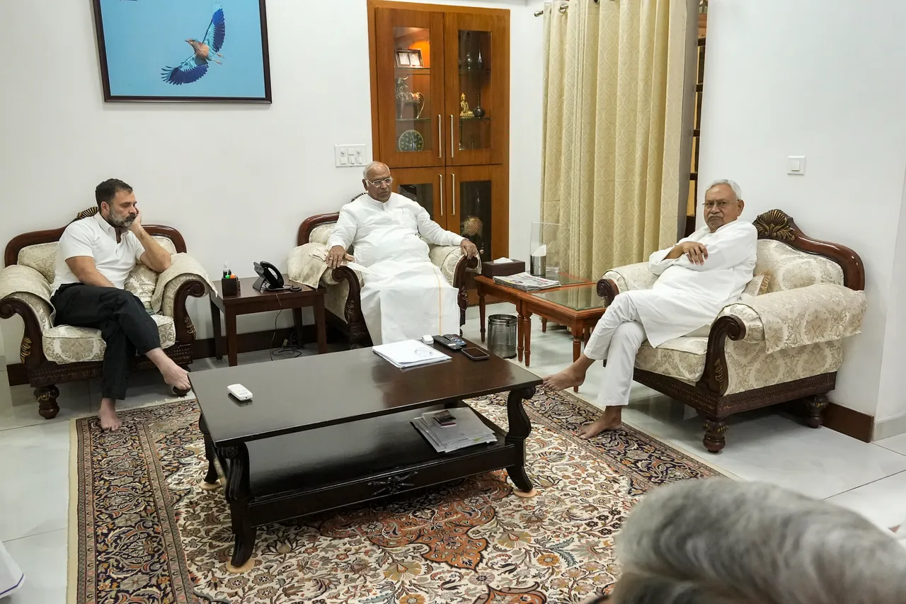 Bihar Chief Minister Nitish Kumar interacts with Congress President Mallikarjun Kharge and Congress leader Rahul Gandhi during a meeting