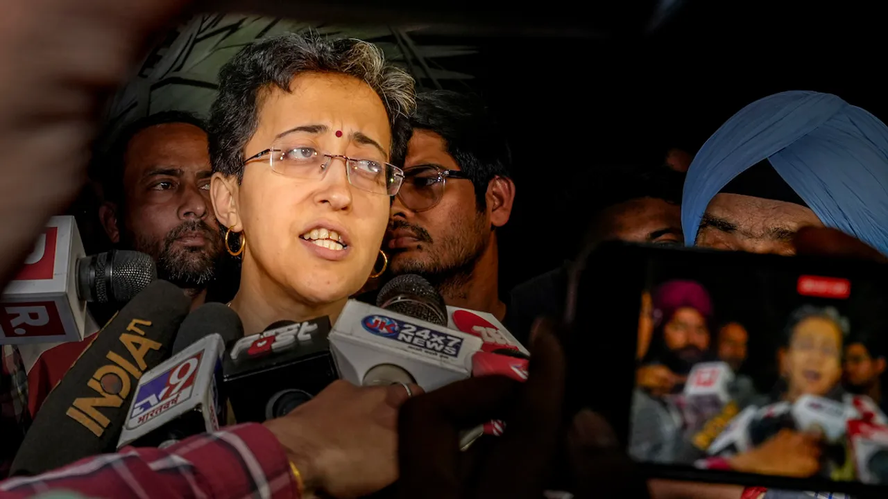 Delhi Minister Atishi Singh outside the residence of Delhi Chief Minister Arvind Kejriwal after an ED team arrived there, shortly after the high court refused to grant Kejriwal protection from coercive action in an excise policy-linked money laundering case, in New Delhi, Thursday, March 21, 2024.
