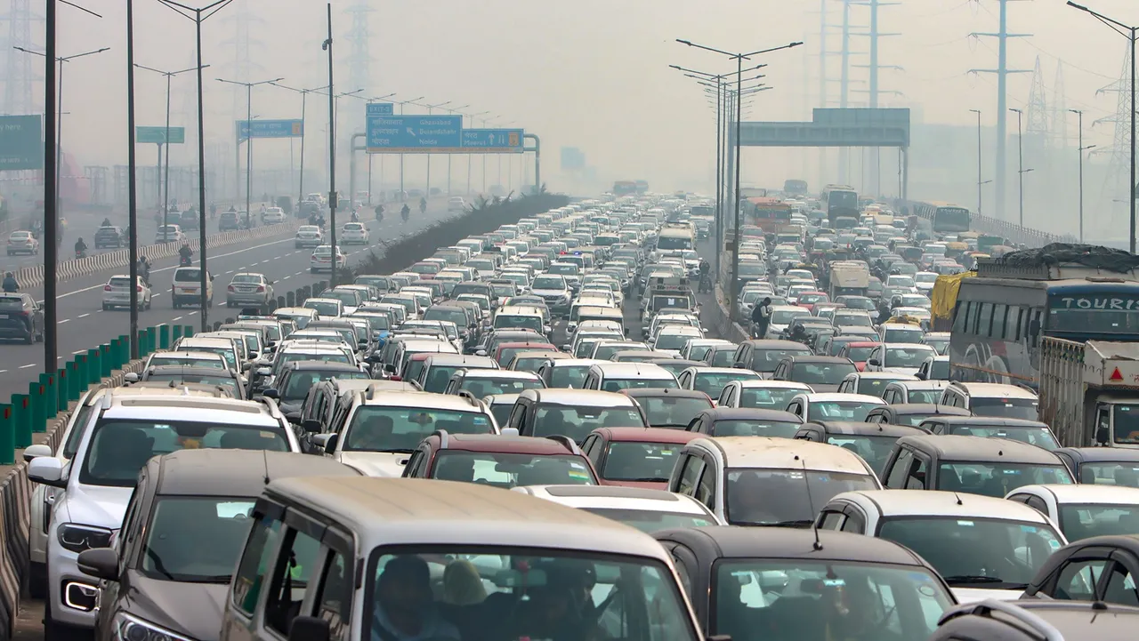 Vehicles stuck in a traffic jam at Ghazipur border amid restrictions in vehicular traffic in view of farmers' 'Delhi Chalo' march, in New Delhi