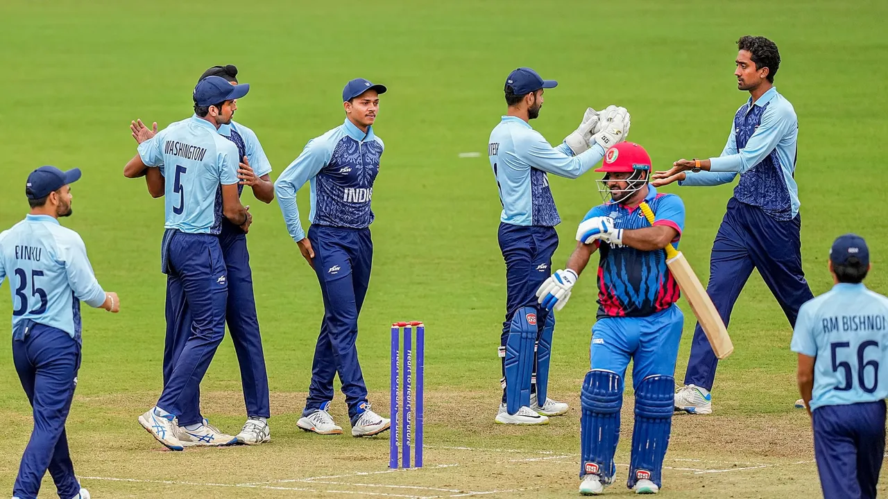 India's Arshdeep Singh celebrates after taking the wicket of Afghanistan's Mohammad Shahzad during the Men's Gold Medal cricket match, at the 19th Asian Games