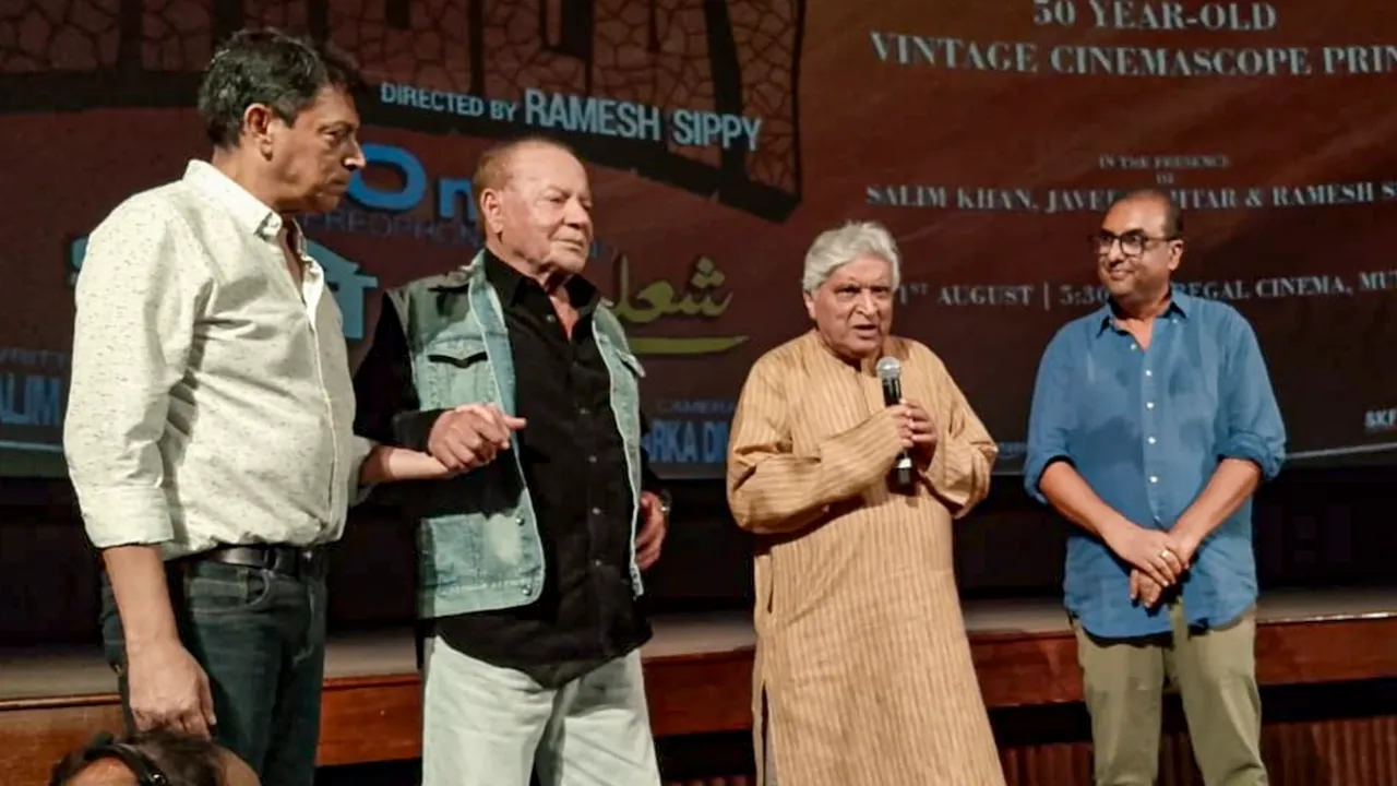 Screenwriter duo Salim Khan and Javed Akhtar with others during a special screening of film 'Sholay', at the Regal Cinema, in Mumbai, Saturday, Aug. 31, 2024. 