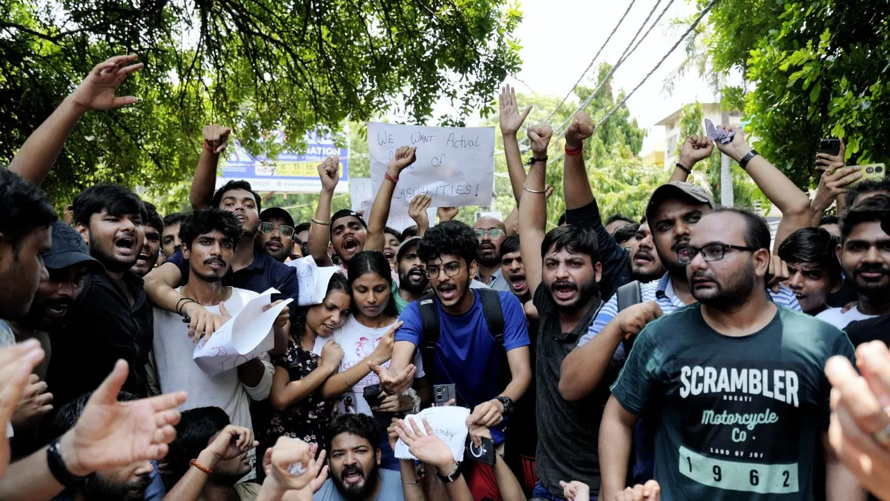 Students stage a protest over the death of three civil services aspirants after the basement of a coaching centre was flooded by rainwater, in New Delhi, Sunday, July 28, 2024.