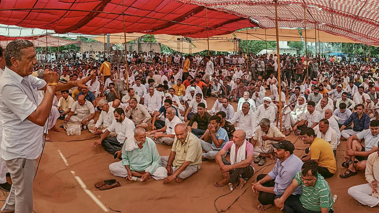 Villagers during a mahapanchayat at Tighra village in the wake of the Nuh violence in Gurugram on Sunday, August 6