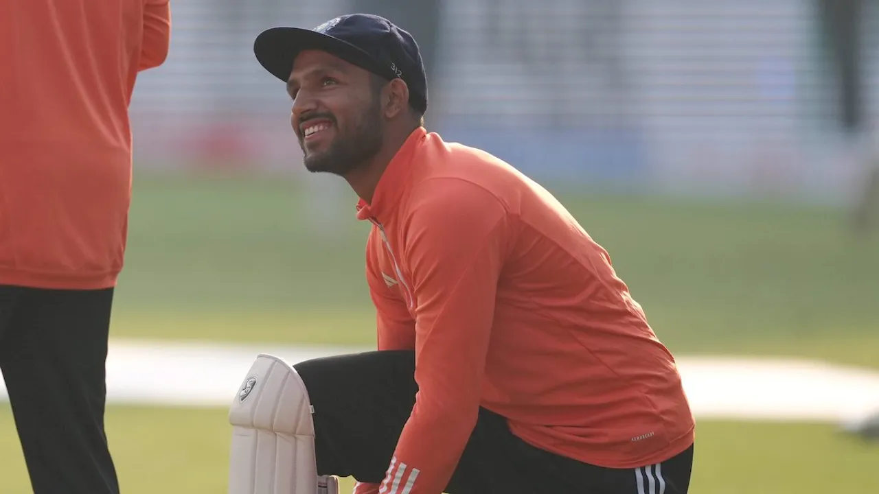 Dhruv Jurel after receiving his debut Test cap during the third cricket Test match between India and England, at Niranjan Shah Stadium, in Rajkot, Thursday, Feb. 15, 2024.