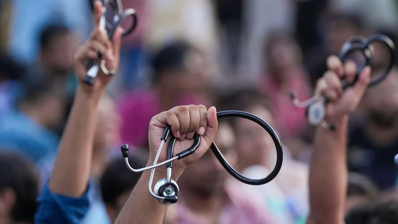 Junior doctors shot slogans as they march towards Swasthya Bhawan during a protest over RG Kar Hospital rape and murder incident, in Kolkata
