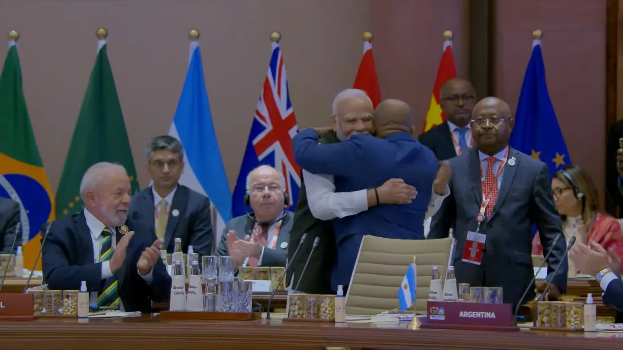 Prime Minister Narendra Modi hugs President of the Union of Comoros and Chairperson of the African Union (AU) Azali Assoumani
