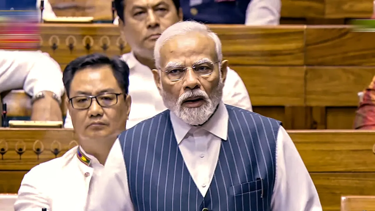Prime Minister Narendra Modi speaks in the Lok Sabha during a special session of the Parliament, in New Delhi