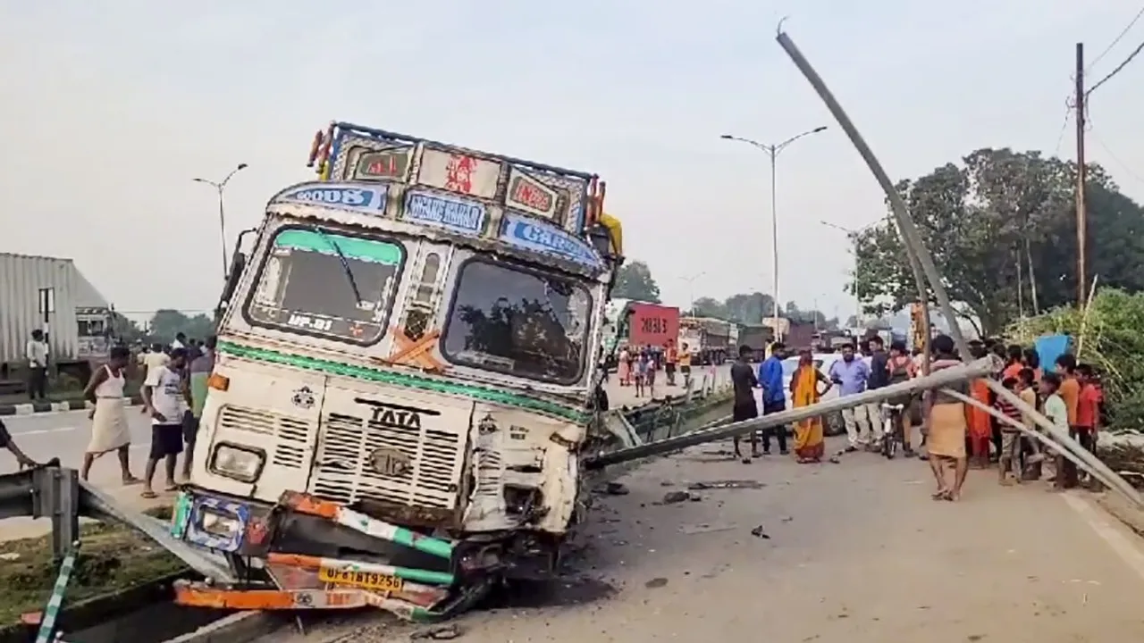 A damaged truck is seen after a collision with a tractor trolley, in Mirzapur district, early Friday, Oct. 4, 2024