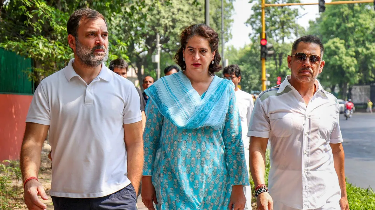 Congress leader Priyanka Gandhi with her husband Robert Vadra and brother Rahul Gandhi arrives to cast her vote at a polling booth during the sixth phase of Lok Sabha elections, in New Delhi, Saturday, May 25, 2024