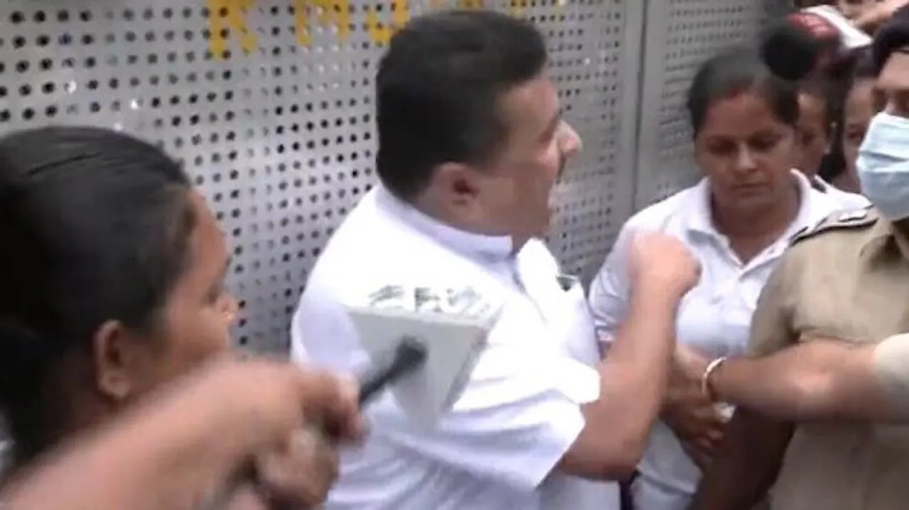 BJP's Suvendu Adhikari stops female cop from touching him during protest march
